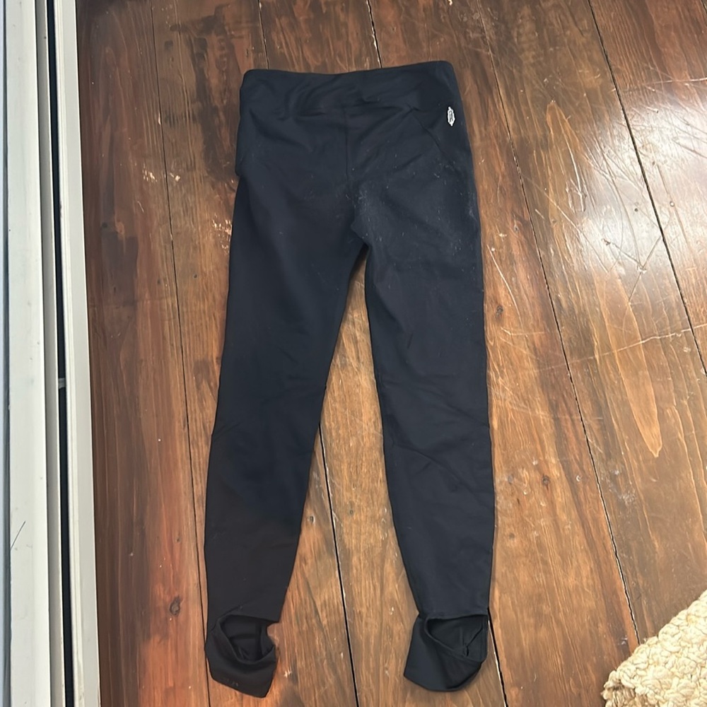 Free people black stirrup leggings.